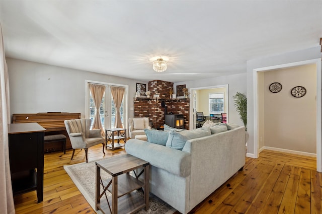 living room featuring hardwood / wood-style floors and a fireplace