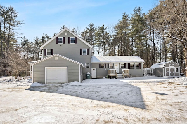 view of front of house with a storage shed