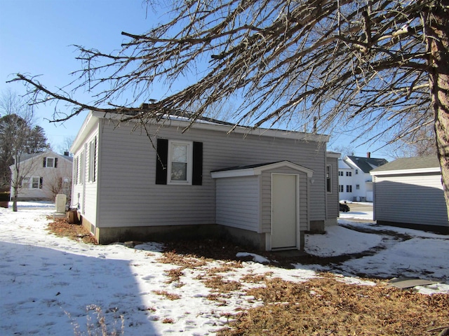 view of snow covered property