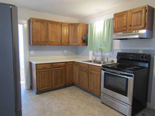 kitchen featuring stainless steel appliances and sink