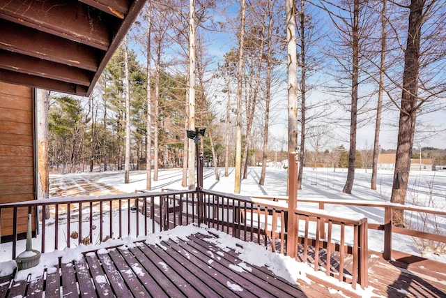 view of snow covered deck