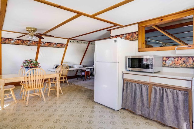 kitchen with white refrigerator and ceiling fan