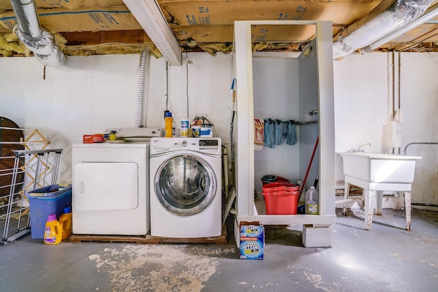 laundry area featuring washer and clothes dryer