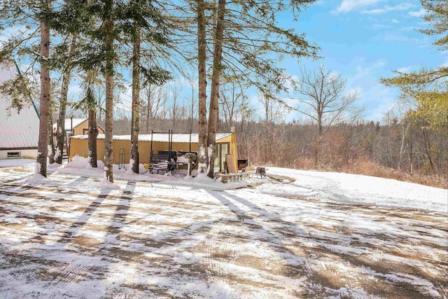 view of yard covered in snow