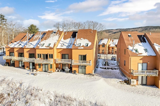 view of snow covered property