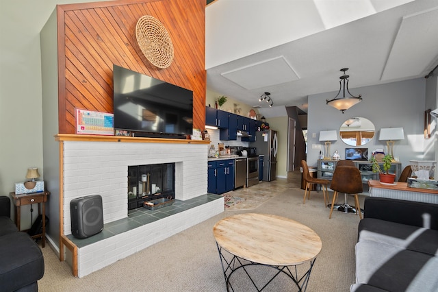 living room featuring a fireplace and wood walls