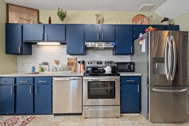 kitchen with decorative backsplash, blue cabinetry, a textured ceiling, and appliances with stainless steel finishes