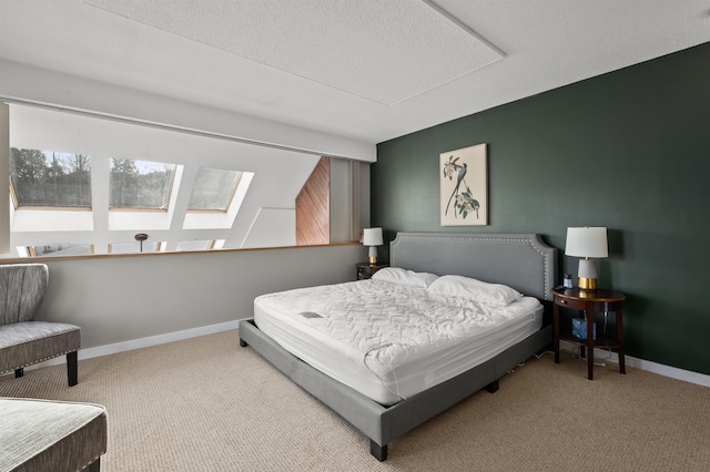 carpeted bedroom featuring a textured ceiling