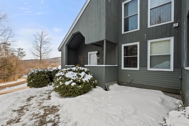 view of snow covered property