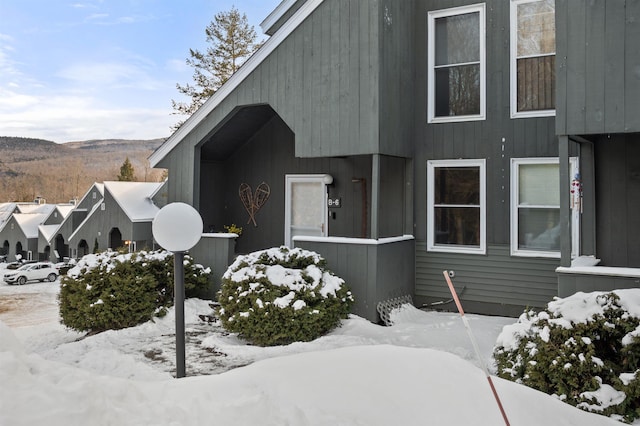 view of snow covered property