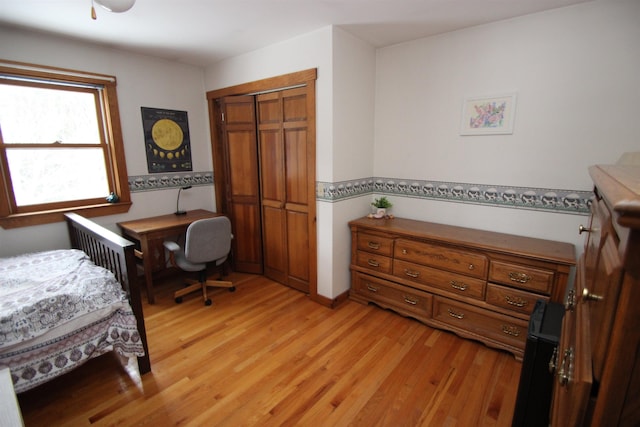 bedroom with light wood-type flooring