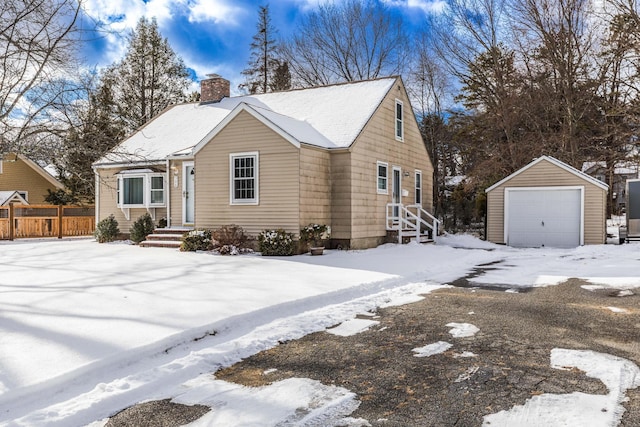 view of front of house with an outbuilding and a garage