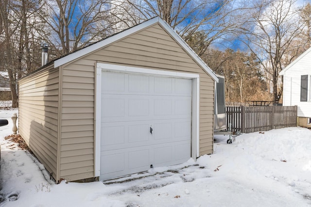 view of snow covered garage