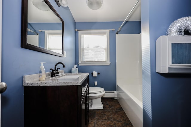 full bathroom with a baseboard radiator, vanity, toilet, and washtub / shower combination