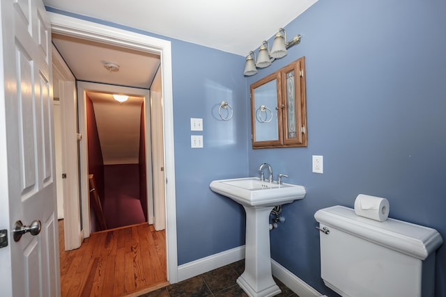 bathroom featuring sink and toilet