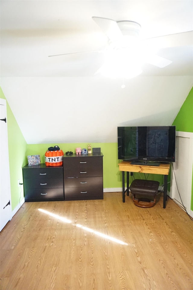 bonus room featuring light hardwood / wood-style flooring, ceiling fan, and vaulted ceiling