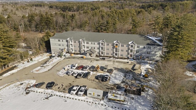 aerial view with a wooded view