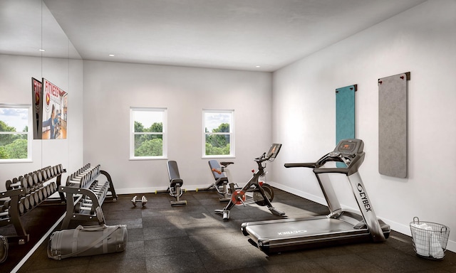 workout area with recessed lighting and baseboards