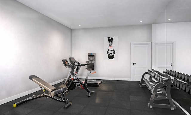 workout area with recessed lighting and baseboards