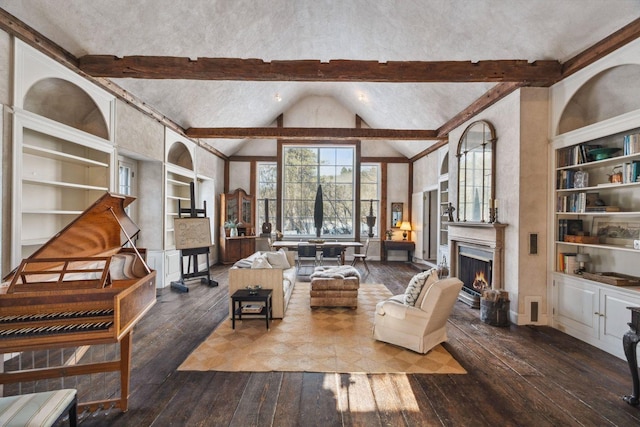 living room featuring wood-type flooring and vaulted ceiling with beams