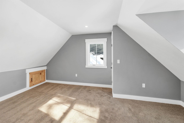 95 Plymouth St, Meredith, NH 03253 - additional living space featuring carpet floors, lofted ceiling, and baseboards