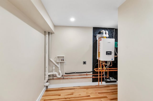 95 Plymouth St, Meredith, NH 03253 - utility room with water heater