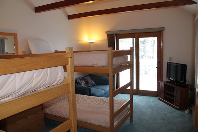 bedroom with beamed ceiling, access to exterior, and dark colored carpet