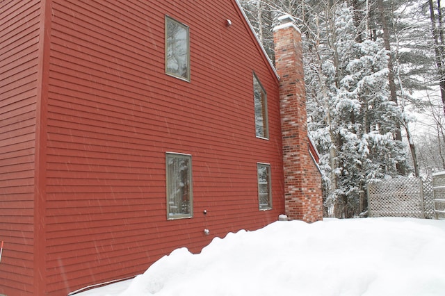 view of snow covered property