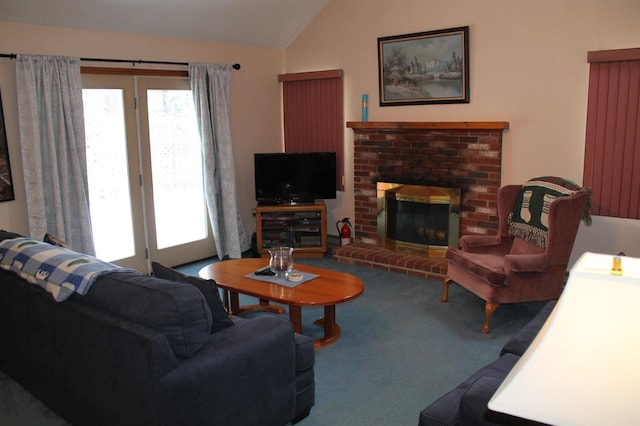 carpeted living room featuring lofted ceiling and a fireplace