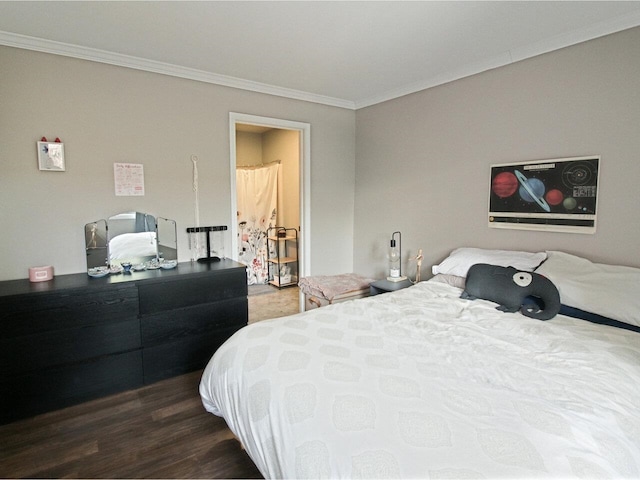 bedroom featuring crown molding and wood-type flooring