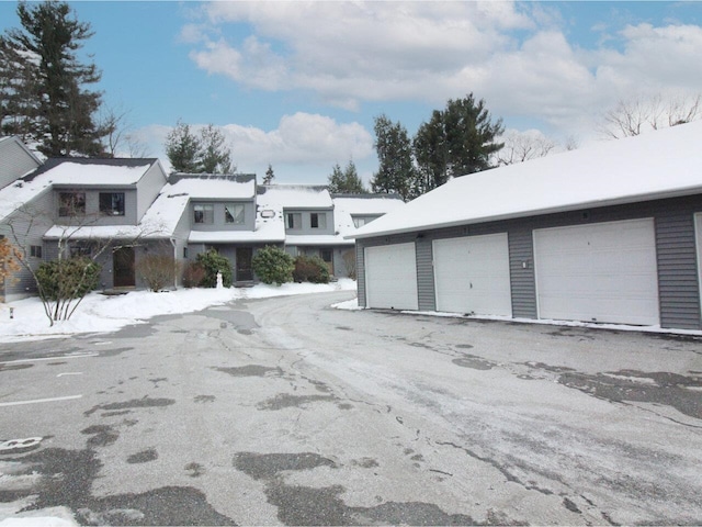 view of snow covered garage