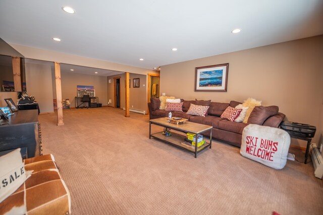 living room featuring a baseboard radiator and light colored carpet