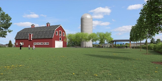 view of property's community featuring an outdoor structure and a lawn