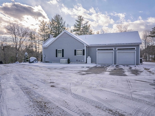 ranch-style home with a garage