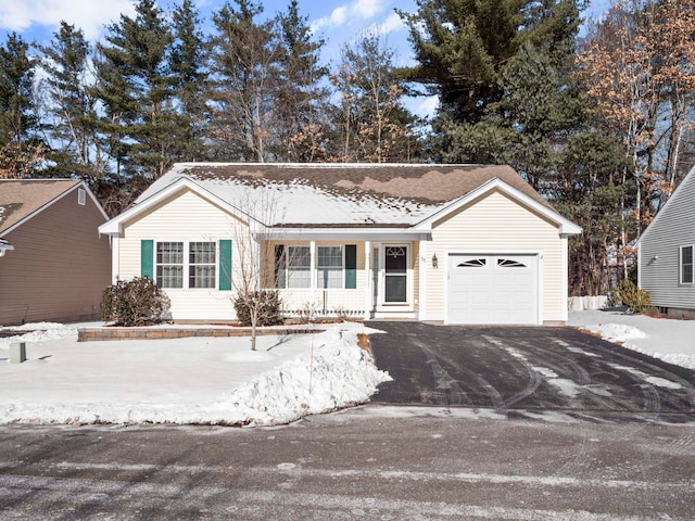 ranch-style house featuring a garage