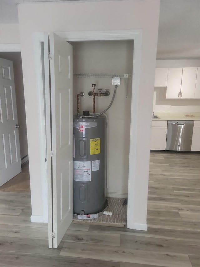 utility room featuring electric water heater