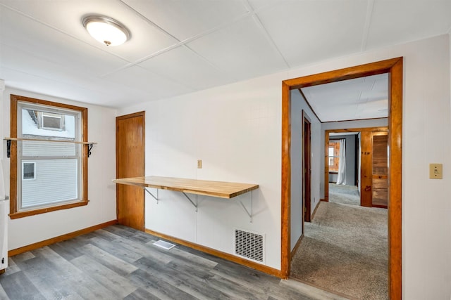 empty room featuring hardwood / wood-style flooring