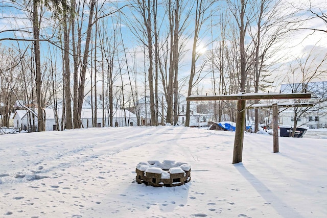 view of yard layered in snow