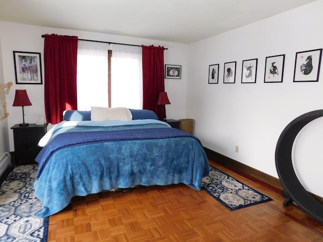 bedroom featuring parquet floors