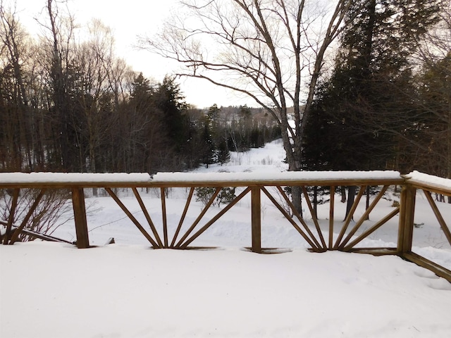 view of snow covered deck