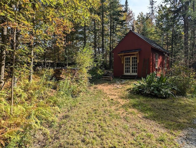 view of yard with french doors