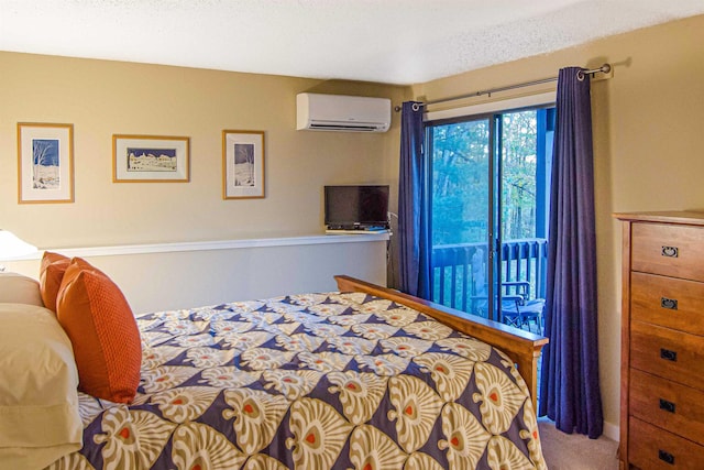 carpeted bedroom with a textured ceiling and a wall mounted AC