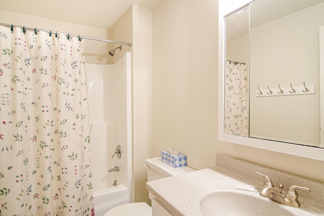 full bathroom featuring shower / bath combination with curtain, vanity, and toilet