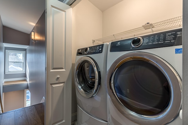 laundry area featuring washer and clothes dryer