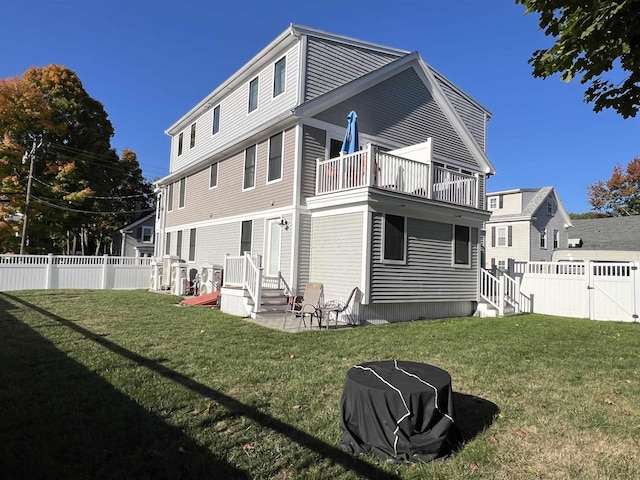 back of house with a yard