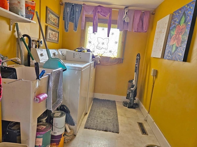 laundry area featuring independent washer and dryer