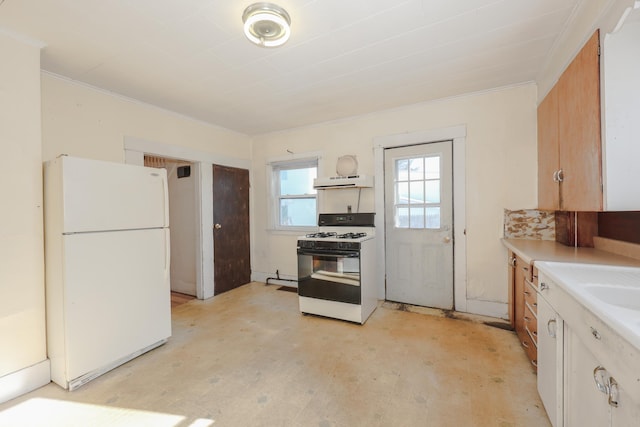 kitchen featuring white appliances and ornamental molding