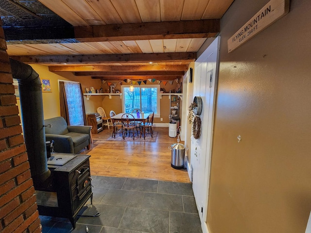 corridor featuring wood ceiling, beam ceiling, and hardwood / wood-style flooring