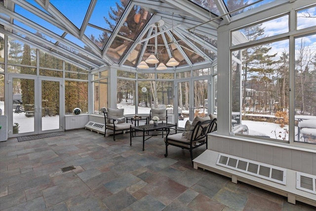 sunroom with vaulted ceiling