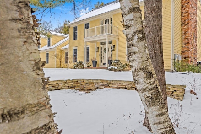 view of snow covered building